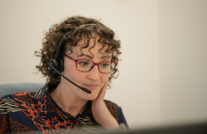 An MS-UK Helpline information officer on a call